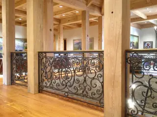 Railing between timber columns.