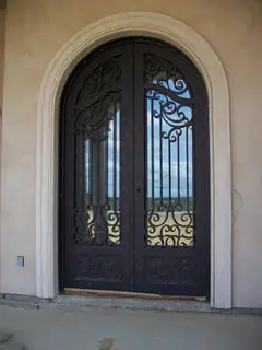Double doors in a stone arch.