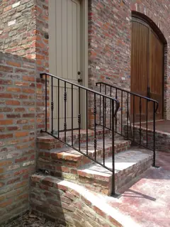 Railing on outdoor steps.