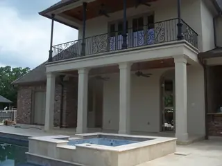Facade with balconies and columns.