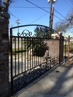 Gate and brick pillar.