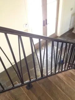 Railing with diagonal lines.
