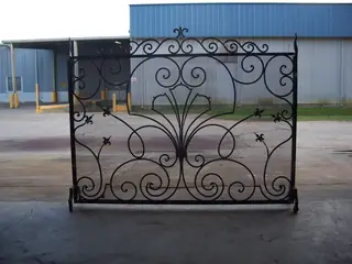 Gate panel with scrollwork.