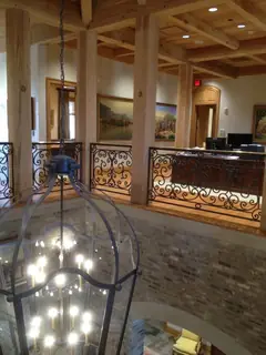 View of the railing through a light fixture.