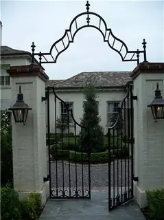 Entrance with arch and gate.