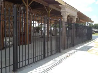 Straight enclosure beneath a roof.