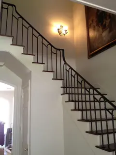 Stairs with a simple linear railing.