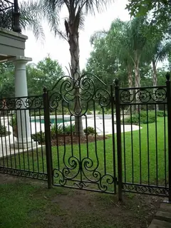 Gate among palms.
