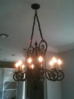 Ceiling light with scrollwork.