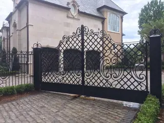 Gate with diamonds and scrolls.