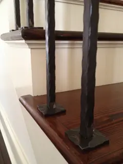 Balusters and tread fixings.