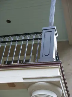 Railing meeting a column.