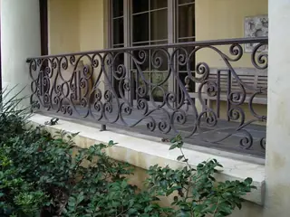 Outdoor scrollwork railing.