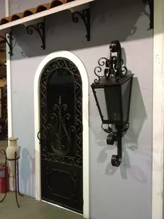 Door and lantern beneath the eaves.