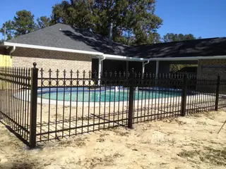 Fence around a swimming pool.