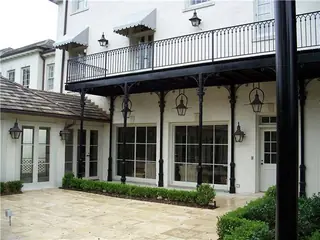 Facade with a long balcony.