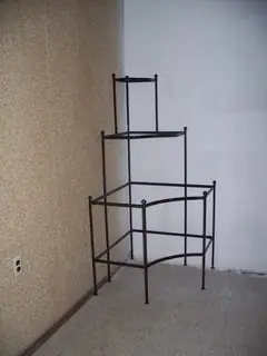 Iron shelving frame without shelves.